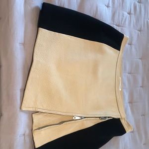 Black and beige mini skirt